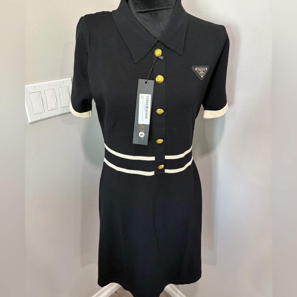Elegant Black Dress with Gold Button Details